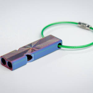 Loud compact whistle